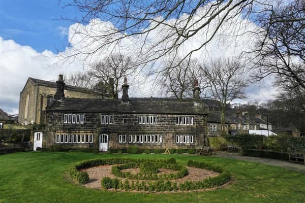 The distinctive stone property in Warley, Halifax, is Grade ll listed.