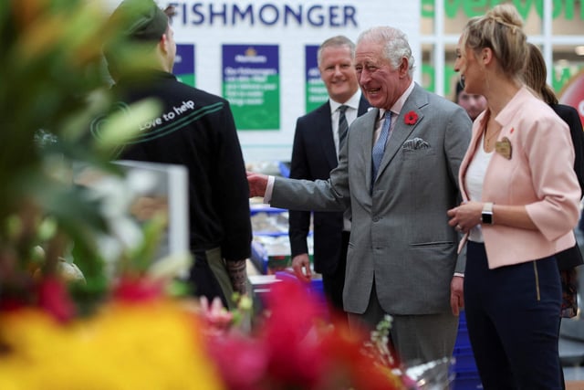 King Charles III speaks with staff during a visit to Morrisons Supermarkets headquarters in Bradford on November 8, 2022 during a two-day tour of Yorkshire (Photo by RUSSELL CHEYNE/POOL/AFP via Getty Images)