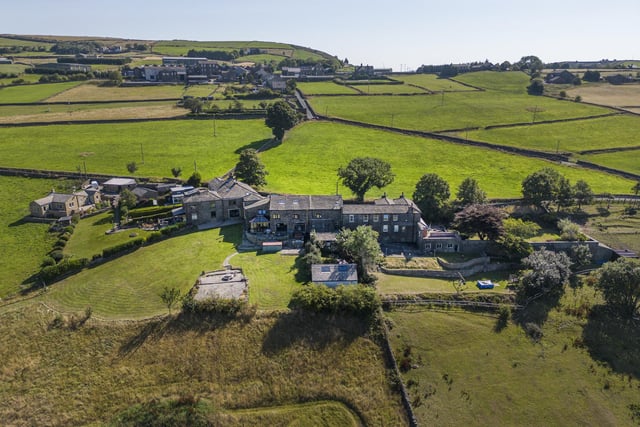 With 2.3 acres of land, Wainstalls House is for sale priced £895,000.