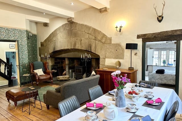 This huge stone fireplace is one stunning remnant of the Hall's former years.