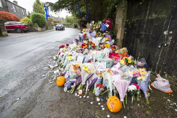 Flowers and tributes for Joe Walsh on Brow Lane, Shelf.