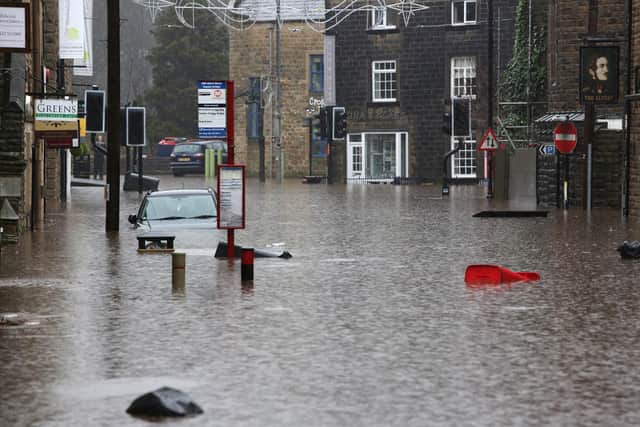 Albert Street and New Road in Hebden Bridge under water after flooding