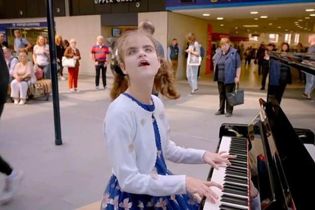 Lucy performing at Leeds Station. Picture: Channel 4
