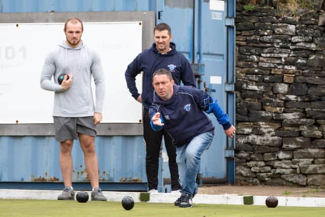 Bowlers in action at Ackroydon Victoria Bowls Club
