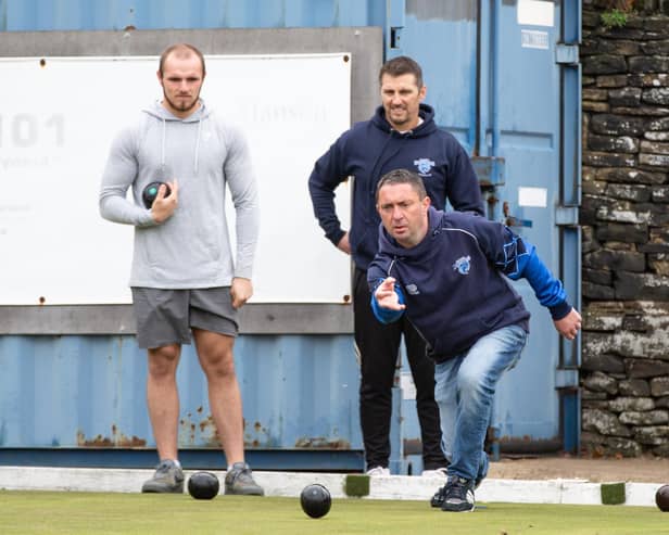 Bowlers in action at Ackroydon Victoria Bowls Club