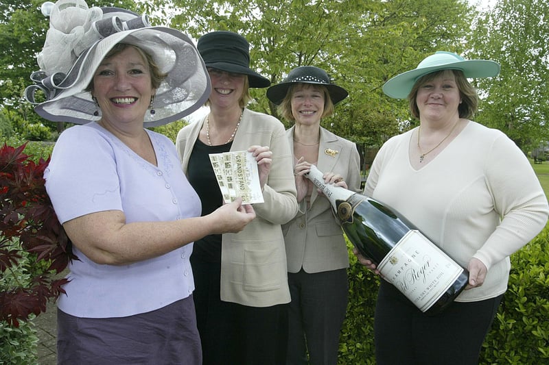 Overgate hospice raffling tickets to Royal Ascot, given to them by Mid Yorkshire Chamber of Commerce, back in May 2005.