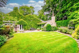 There is a stunning lawned and enclosed garden to the rear of the Hipperholme property.