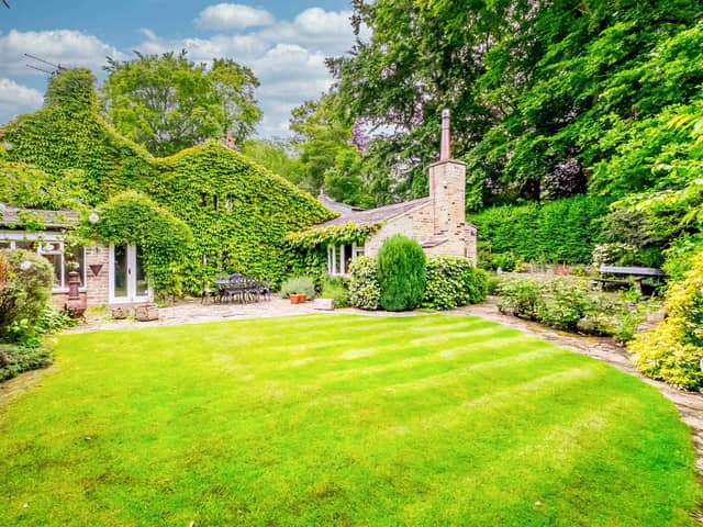There is a stunning lawned and enclosed garden to the rear of the Hipperholme property.
