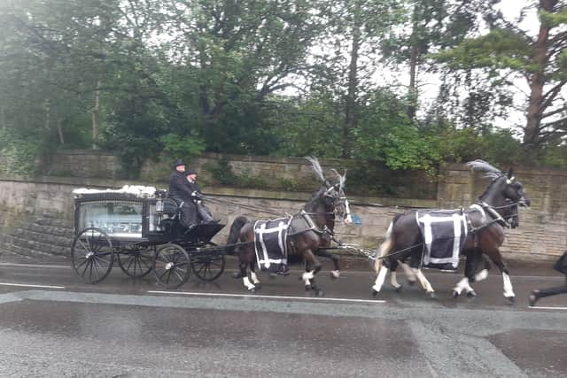 The horse-drawn carriage for the funeral of Jamie Sheils at Halifax Minster today
