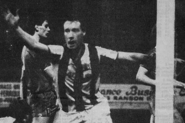 Kellock celebrates after scoring the second goal of his hat-trick against Wrexham at The Shay on 14 March 1986.