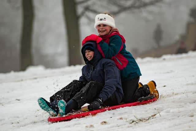 Stanley and Florence Sledging at Shibden Park, Halifax