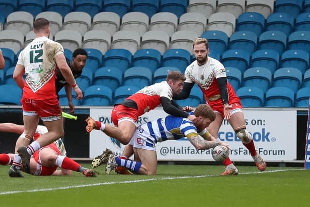 Joe Keyes goes over for the Panthers for one of five first half tries which gave them a healthy half-time lead against the Cougars.