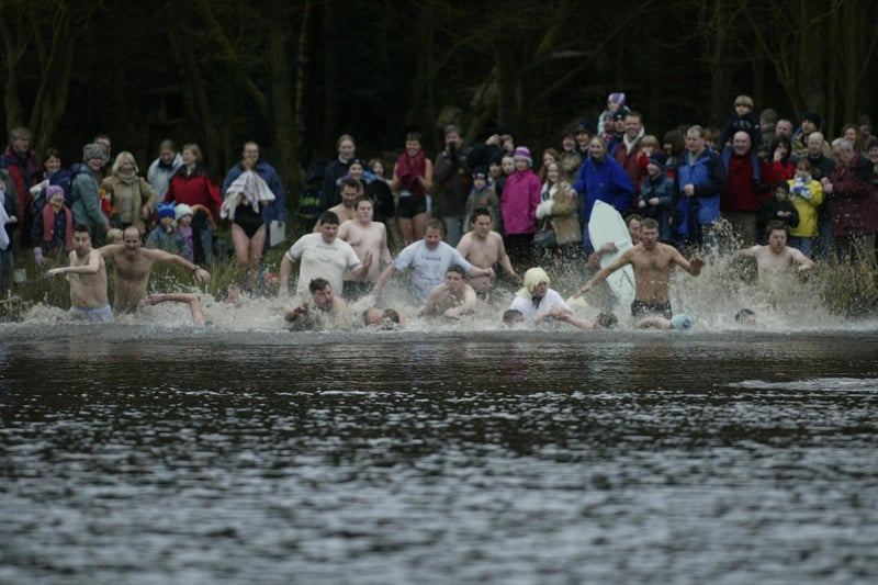 Swimmers at the Lumbutts Dam New Year swim back in 2004.
