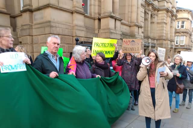 Campaigners and councillors fighting the Local Plan proposals lobby outside Halifax Town Hall ahead of a council meeting in March.