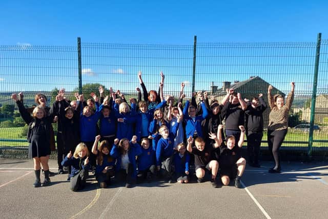 Staff and pupils celebrate Old Town Primary School's Ofsted success