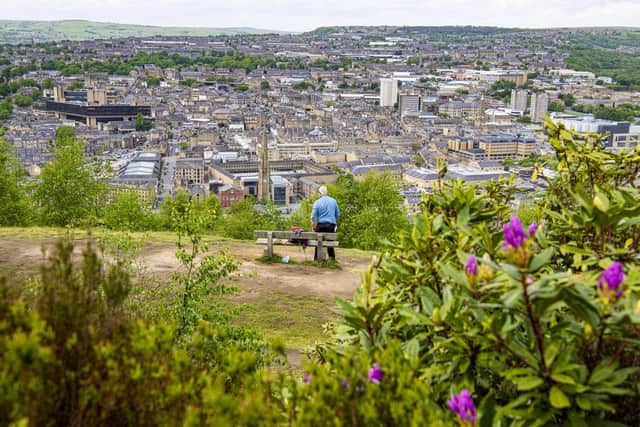Positive outlook: The council's vision for Calderdale has been praised by local government experts. Pictured, above, is a view of Halifax from Beacon Hill