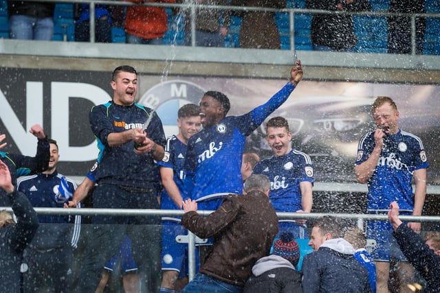 The Halifax players crack open the champagne