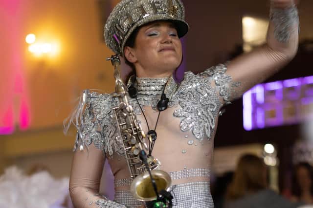 Ellie Sax performing at the fundraising event