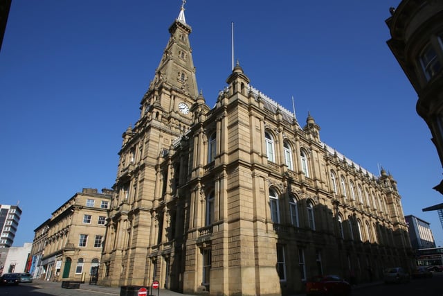 The architect who designed Halifax Town Hall in 1863 was also responsible for designing the Houses of Parliament. The town hall was his last major commission and was completed a few years after his death.
