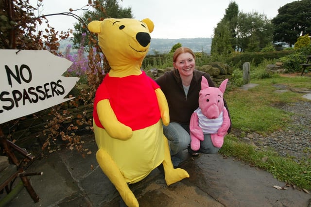 Sarah with Winnie the Pooh and Piglet back in 2003.