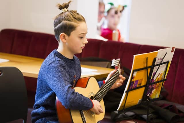 William Pool, 10, performs in the cafe at Calderdale Music