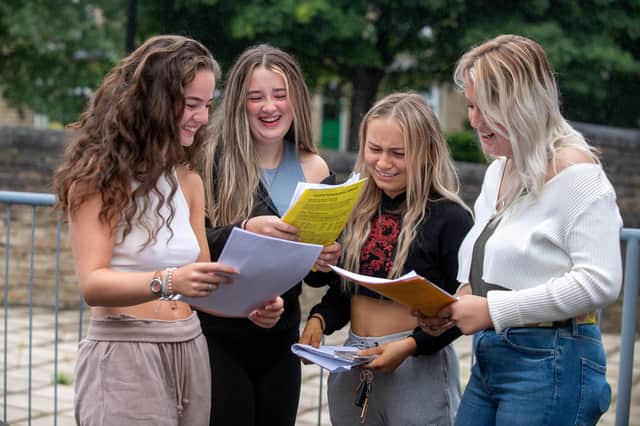 A-levels: These are the main national statistics from today's exam results. Picture shows people collecting their results
18 August 2022.  Picture Bruce Rollinson