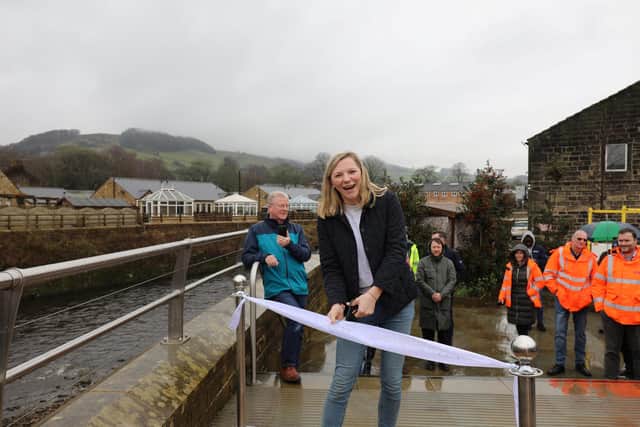 Jo Ward from Jo’s Kitchen cut the ribbon to mark the official reopening of the bridge in Mytholmroyd