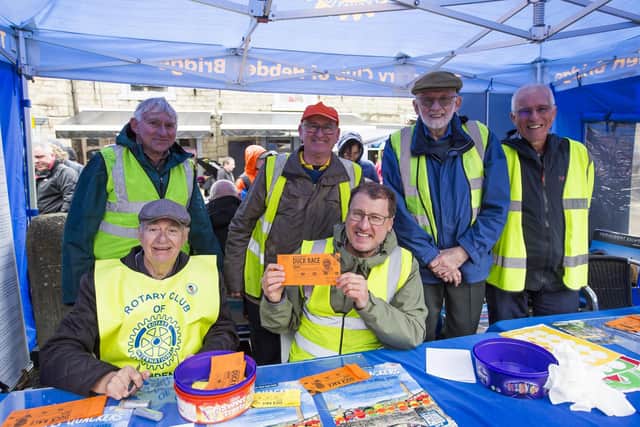 Rotary Club of Hebden Bridge, selling tickets at last year's Duck Race.
