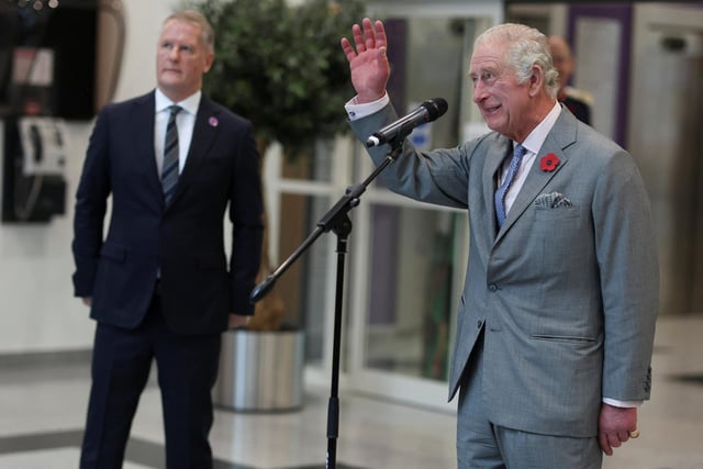 King Charles III gestures next to David Potts, chief executive of Morrisons Supermarkets, at its headquarters during an official visit to Yorkshire on November 8, 2022 in Bradford  (Photo by Russell Cheyne - WPA Pool/Getty Images)