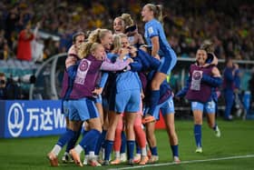 AUGUST 16: Alessia Russo of England celebrates with teammates after scoring her team's third goal during the FIFA Women's World Cup Australia & New Zealand 2023 Semi Final match between Australia and England at Stadium Australia on August 16, 2023 in Sydney, Australia. (Photo by Justin Setterfield/Getty Images )