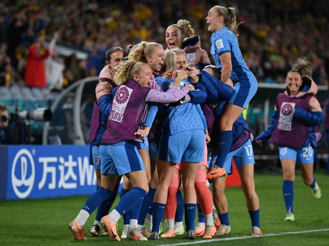 AUGUST 16: Alessia Russo of England celebrates with teammates after scoring her team's third goal during the FIFA Women's World Cup Australia & New Zealand 2023 Semi Final match between Australia and England at Stadium Australia on August 16, 2023 in Sydney, Australia. (Photo by Justin Setterfield/Getty Images )