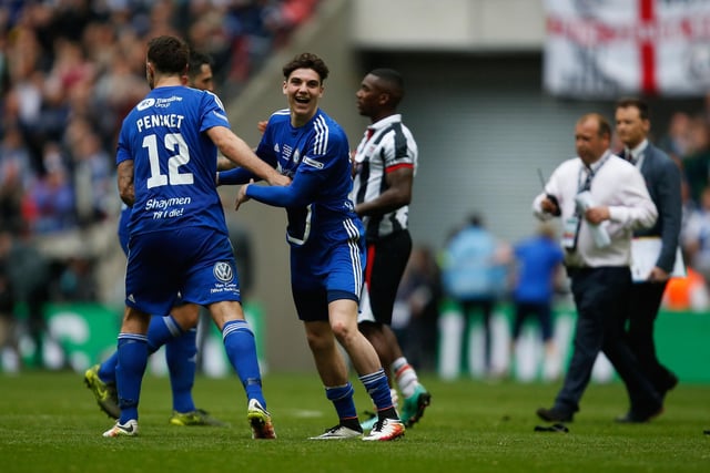 LONDON, ENGLAND - MAY 22:  Josh MacDonald of Halifax Town celebrates with teammate Richard Peniket during the FA Trophy Final match between Grimsby Town FC v FC Halifax Town at Wembley Stadium on May 22, 2016 in London, England.  (Photo by Joel Ford/Getty Images)