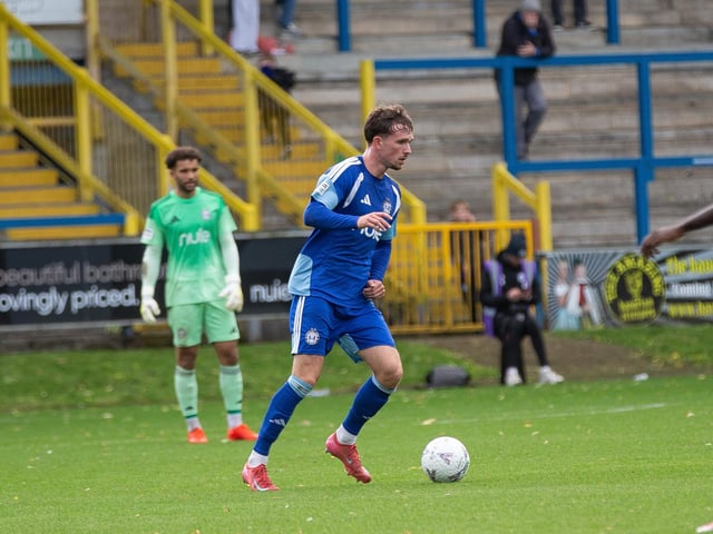 One or two passes went astray but tried to find a forward pass when he could, easily got the better of Paul Blackett, defended well overall - 7/10