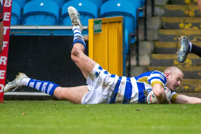 Jake Maizen goes over for Halifax against Sheffield Eagles.