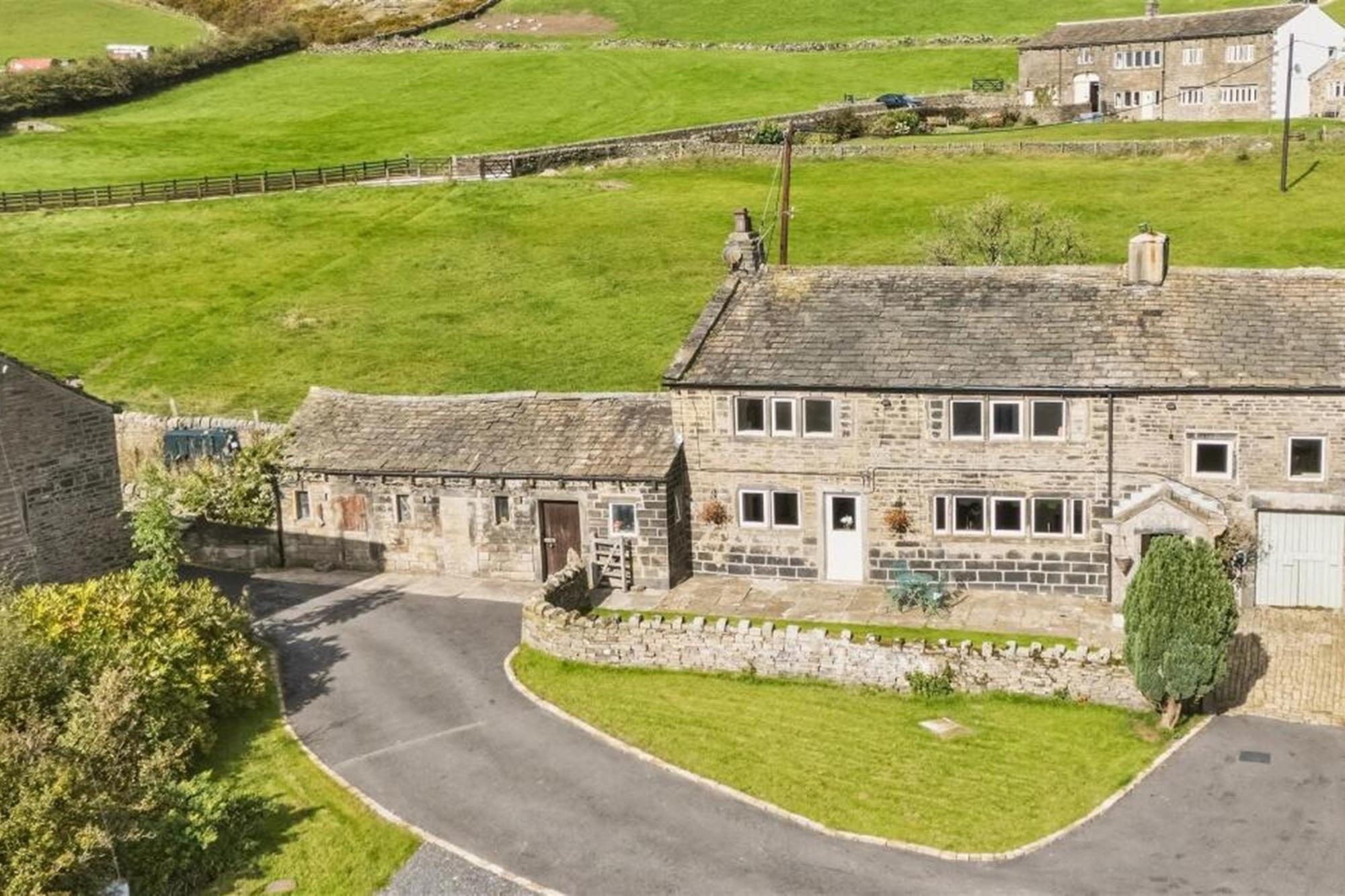 Five bedroom Grade II listed farmhouse believed to date from 1600s is on the market