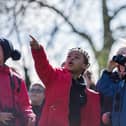 Children using binoculars on an RSPB nature reserve school trip