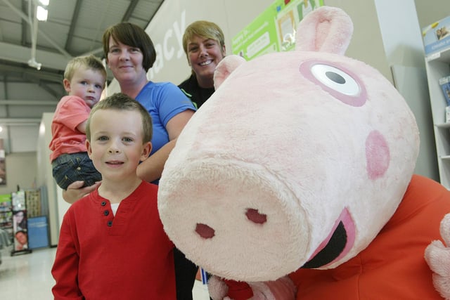 Peppa Pig at Halifax Asda with Jacqui Burns and sons Charlie Hoyle, two, and Alfie Hoyle, five, and Asda community colleague Amanda Goldsborough.