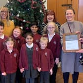 Coun Sarah Courtney, Calderdale Council’s Cabinet Member for Towns, Engagement and Public Health, presents the Silver Healthy Schools award to Headteacher, Alice Leadbitter at Todmorden C of E Junior, Infant and Nursery School.