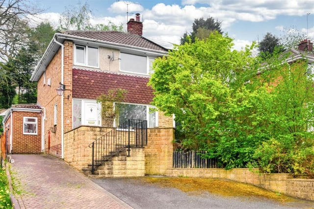 This three bedroom semi-detached home is on the market for £235,000 with Peter David Properties