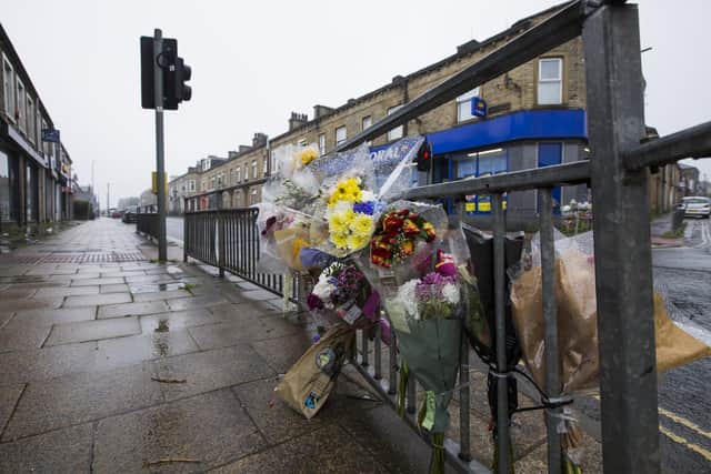 Flowers left for the much-loved woman who died