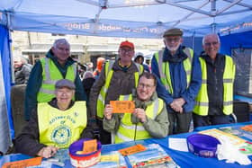 Rotary Club of Hebden Bridge, selling tickets, from the left, Danny Mollan, Nigel Robinson, Peter Lord, Mike Tull, Stephen Edwards and Dick Holborow.