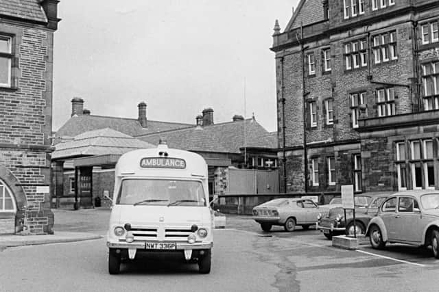Archive photos of the Royal Infirmary in Halifax with an ambulance pictured near the entrance to the hospital's accident and emergency department