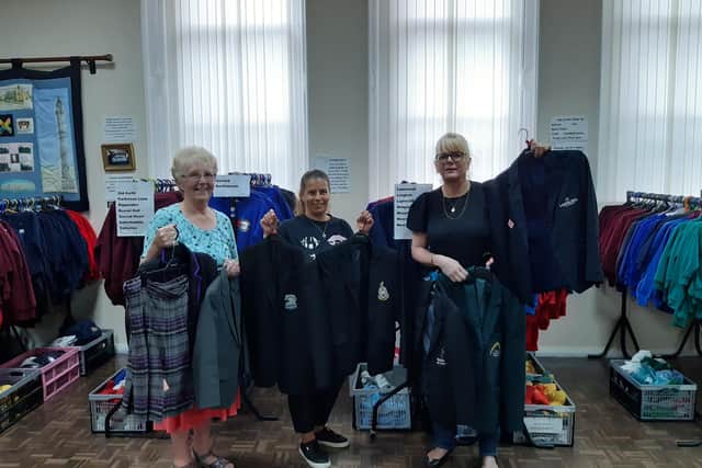 Some of the team at Halifax YMCA's school uniform exchange - volunteer Carol Green, staff member Nyree Bunting and manager Debbie Pearson