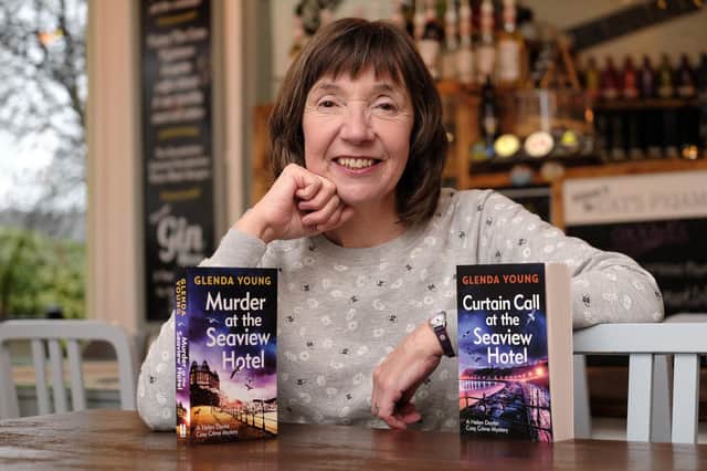 Author Glenda Young with a couple of her cosy crime books