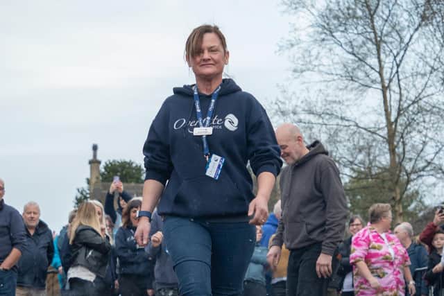 A fundraiser takes on the firewalk
