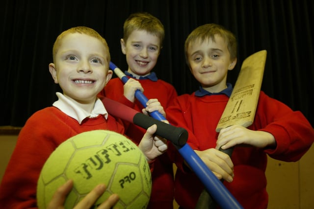 Elland Boys Brigade members celebrate sponsorship money that will help them uy new sports equipment in 2010. From the left Sam Wilson five, Christopher Jackson seven and Joshua Crowther seven.