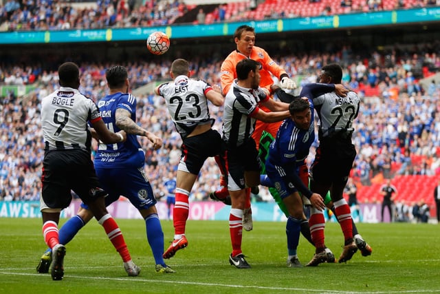 LONDON, ENGLAND - MAY 22:  Grimsby Town goalkeeper James McKeown contest a last minute corner during the FA Trophy Final match between Grimsby Town FC v FC Halifax Town at Wembley Stadium on May 22, 2016 in London, England.  (Photo by Joel Ford/Getty Images)