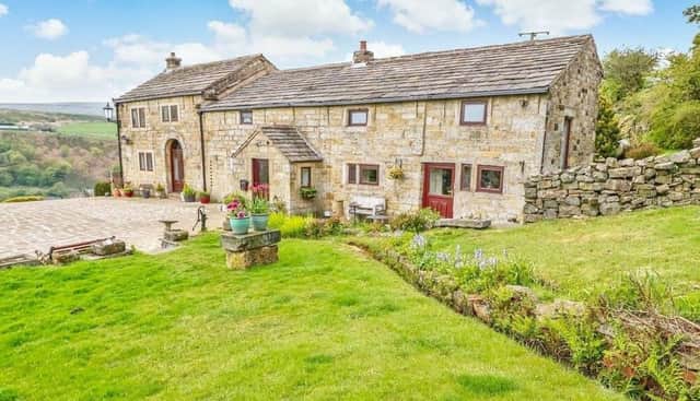 The appealing farmhouse has panoramic views, with an annexe that can be used as a source of income.