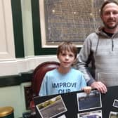 Charlie Ryan, left, and his dad Ben Ryan at Halifax Town Hall