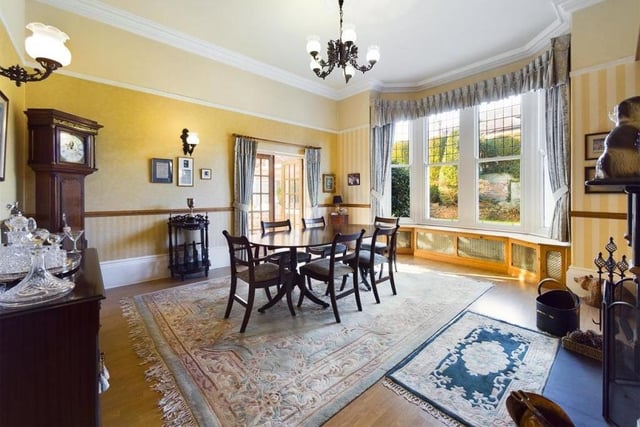This spacious dining room leads directly through to the garden room.